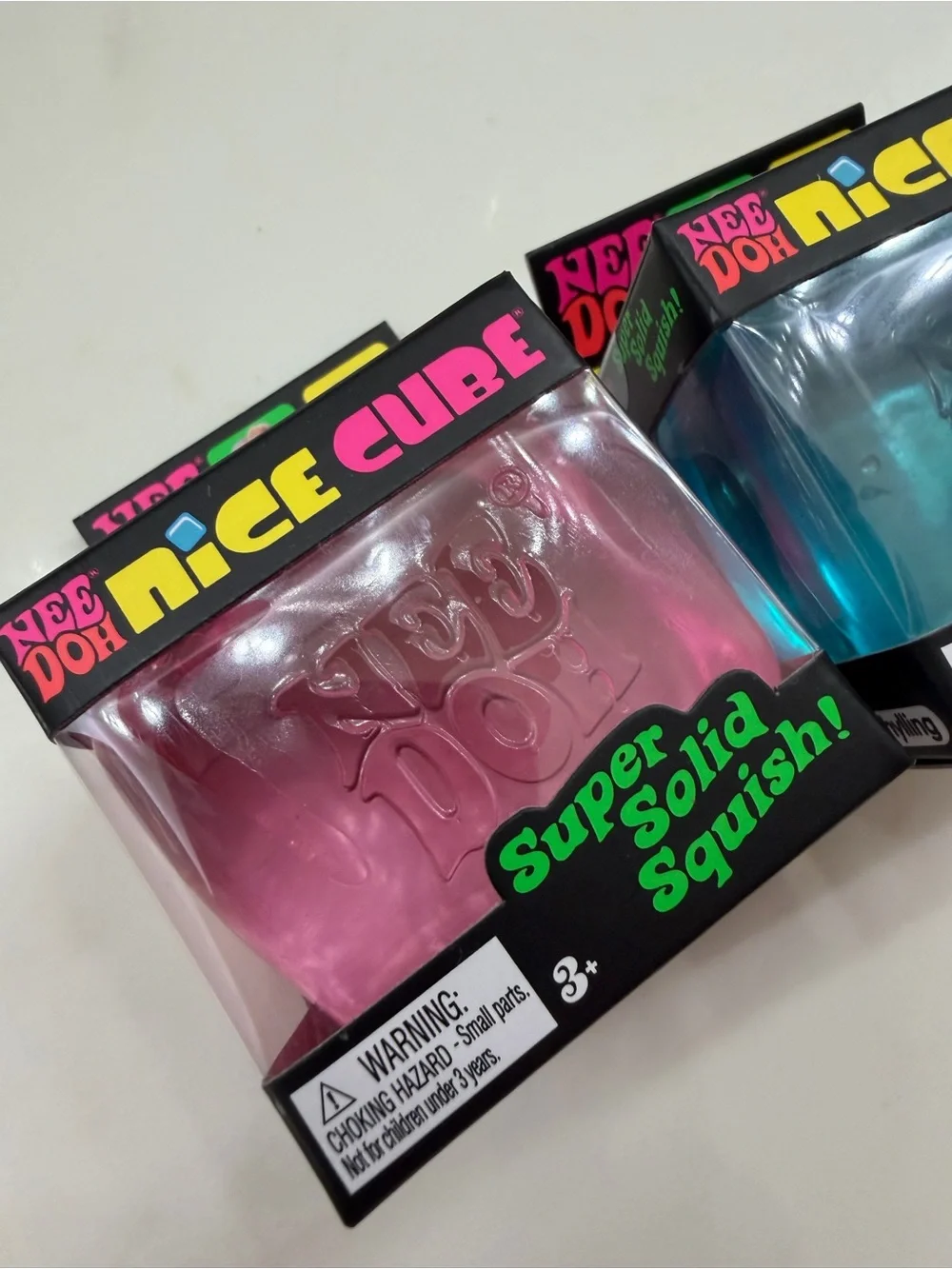 NeeDoh Nice Cube Super Solid Squish Toy - 2 Pack Bundle. Blue, Pink